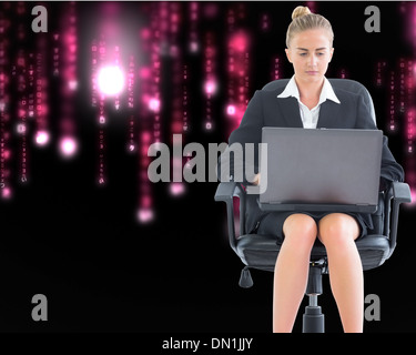 Composite image of businesswoman sitting on swivel chair with laptop Stock Photo