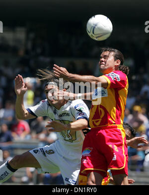 Mar 19, 2006; Mexico City, Mexico; UNAM Pumas BRUNO MARIONI fights for the ball with UAG Tecos defender Miguel Hernandez during their soccer match at the University Stadium in Mexico City. UAG Tecos won 1-0 against the UNAM Pumas. Mandatory Credit: Photo by Javier Rodriguez/ZUMA Press. (©) Copyright 2006 by Javier Rodriguez Stock Photo