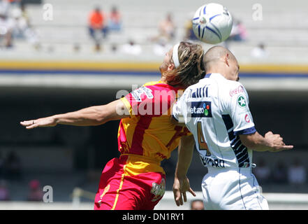 Mar 19, 2006; Mexico City, Mexico; UNAM Pumas defender DARIO VERON (R) fights for the ball with UAG Tecos forward CARLOS DAVID CASARTELLI during their soccer match march 19, 2006 at the University Stadium in Mexico City. UAG Tecos won 1-0 to UNAM Pumas. Mandatory Credit: Photo by Javier Rodriguez/ZUMA Press. (©) Copyright 2006 by Javier Rodriguez Stock Photo