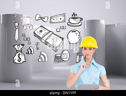 Composite image of thoughtful attractive architect holding clipboard Stock Photo
