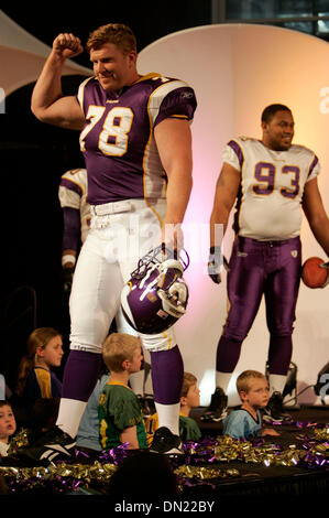 Apr 27, 2006; Bloomington, MN, USA; Minnesota Vikings unveil new uniforms on Thursday at the Mall of America. Matt Birk, 78, in the new home uniform and Kevin Williams, #93 (back right) in the new away uniform. Mandatory Credit: Photo by Carlos Gonzalez/Minneapolis Star T/ZUMA Press. (©) Copyright 2006 by Minneapolis Star T Stock Photo