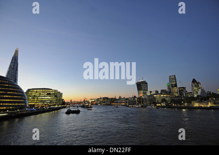 View from Tower Bridge along the River Thames with City Hall and The Shard on left and City of London to right Stock Photo