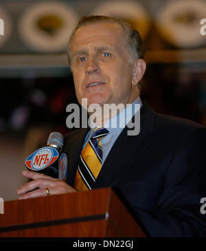 Utah quarterback Alex Smith, left, holds up a San Francisco 49ers jersey  with NFL commissioner Paul Tagliabue after the 49ers selected him as the  No. 1 overall pick in the NFL Draft