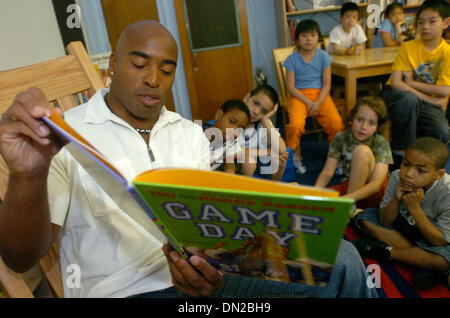 Jun 13, 2006; Manhattan, New York, USA; NY Giants running back TIKI BARBER reads from his new book 'Game Day' to NYC Public School Students at New York City's PS 33 (Chelsea Prep).  Mandatory Credit: Photo by Bryan Smith/ZUMA Press. (©) Copyright 2006 by Bryan Smith Stock Photo