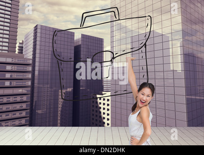 Composite image of happy and classy brunette posing Stock Photo