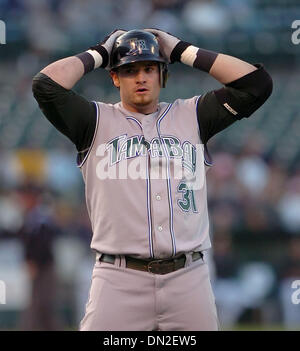 Tampa Bay Devil Rays Tim Corcoran puts his forearm to his head in