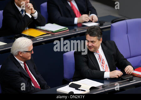 Berlin, Germany. December 18th, 2013. Session of the German Parliament - Chancellor Merkel gives a  Governmental declaration to the next European council. / Picture: Frank-Walter Steinmeier (SPD), Minister of Foreign Office, and Sigmar Gabriel (SPD), Minister of Economy and Energy, Credit:  Reynaldo Chaib Paganelli/Alamy Live News Stock Photo