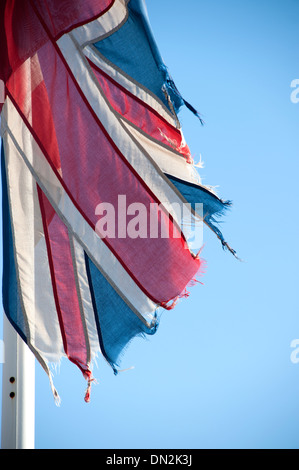 Torn tattered Union Jack Flag England English worn Stock Photo