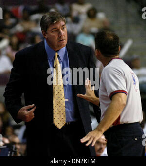 Detroit Shock coach Bill Laimbeer smiles in the final seconds of the ...