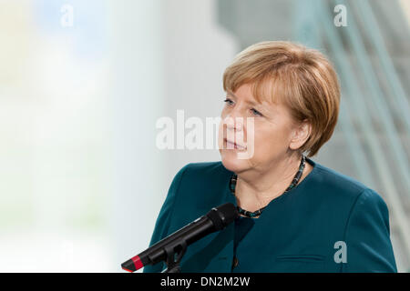 Berlin, Germany. December 18th, 2013. Chancellor Angela Merkel and Ursula von der Leyen (CDU), Minister of Defence, receives family members of the soldiers as well as policemen who are in the foreign assignment, to a Christmas conversation at the Chancellery in Berlin. / Picture: Chancellor Angela Merkel (CDU), Chancellor, Credit:  Reynaldo Chaib Paganelli/Alamy Live News Stock Photo