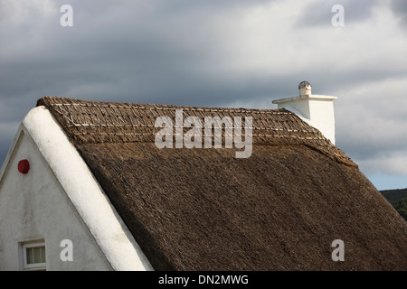 Traditional Old Irish Cottage with a thatched roof in Connemara, Co. Galway, Ireland Stock Photo