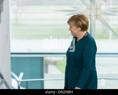 Berlin, Germany. December 18th, 2013. Chancellor Angela Merkel and Ursula von der Leyen (CDU), Minister of Defence, receives family members of the soldiers as well as policemen who are in the foreign assignment, to a Christmas conversation at the Chancellery in Berlin. / Picture: Chancellor Angela Merkel (CDU), Chancellor, Credit:  Reynaldo Chaib Paganelli/Alamy Live News Stock Photo