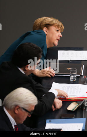 Berlin, Germany. 18th Dec, 2013. German Chancellor Angela Merkel (upper) attends a meeting session at Bundestag, Germany's lower house of parliament, in Berlin, Germany on Dec. 18, 2013. German Chancellor Angela Merkel Wednesday called on member states of the European Union (EU) to commit to binding reform contracts during her first speech after being sworn in for a third term a day before. Credit:  Zhang Fan/Xinhua/Alamy Live News Stock Photo