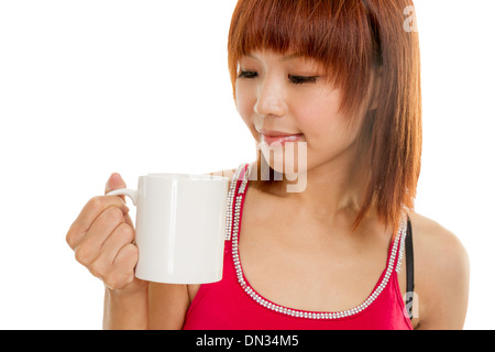 Chinese female in red dress with coffee cup Stock Photo