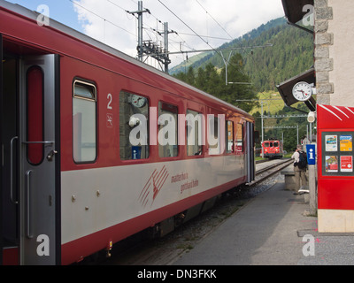 Railway station on the Matterhorn Gothard bahn, Glacier express, in the village Munster in Switzerland Stock Photo