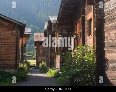Old typical traditional wooden timber houses in the village Ulrichen in the district of Goms in the Swiss alps Stock Photo