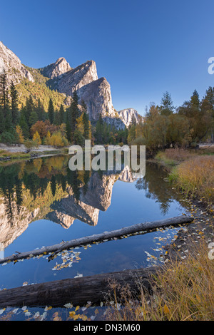 The Three Brothers reflected in the Merced River, Yosemite Valley, California, USA. Autumn (October) 2013.