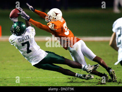 Oct 14, 2006; Austin, TX, USA; NCAA Football: Aaron Ross breaks up a pass intended for Baylor's Dominique Zeigler in the second half Saturday, October 14, 2006 at Darrell K. Royal-Texas Memorial Stadium at Joe Jamail Field in Austin, TX. UT quarterback Colt McCoy set a team record with six touchdown throws as Texas won the game, 63-31.  Mandatory Credit: Photo by Bahram Mark Sobhan Stock Photo