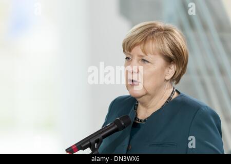 Berlin, Germany. 18th Dec, 2013. Chancellor Angela Merkel and Ursula von der Leyen (CDU), Minister of Defence, receives family members of the soldiers as well as policemen who are in the foreign assignment, to a Christmas conversation at the Chancellery in Berlin. / Picture: Chancellor Angela Merkel (CDU), Chancellor.Photo: Reynaldo Paganelli/NurPhoto Credit:  Reynaldo Paganelli/NurPhoto/ZUMAPRESS.com/Alamy Live News Stock Photo