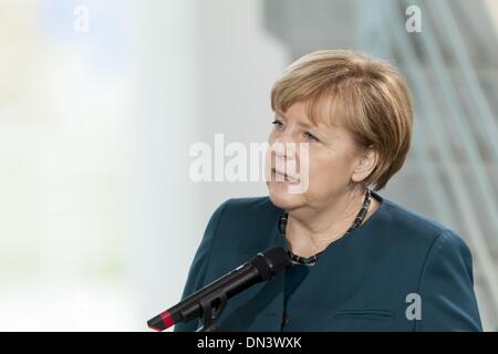 Berlin, Germany. 18th Dec, 2013. Chancellor Angela Merkel and Ursula von der Leyen (CDU), Minister of Defence, receives family members of the soldiers as well as policemen who are in the foreign assignment, to a Christmas conversation at the Chancellery in Berlin. / Picture: Chancellor Angela Merkel (CDU), Chancellor.Photo: Reynaldo Paganelli/NurPhoto Credit:  Reynaldo Paganelli/NurPhoto/ZUMAPRESS.com/Alamy Live News Stock Photo