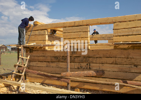 Construction of a log house in Ulan Ude, capital city of the Republic of Buryatia, Ulan Ude, Siberia, Russia Stock Photo