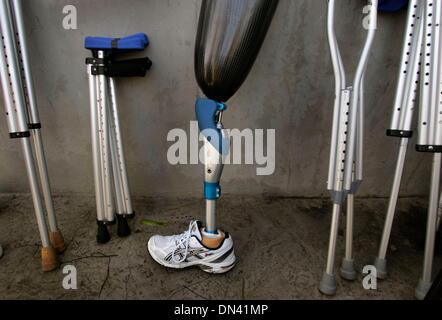 Nov 05, 2006; San Diego, CA, USA; Walking aids and a prosthesis lean against the stairway wall leading to La Jolla Cove where their owners were participating in the swimming portion of the 13th Annual San Diego Triathlon Challenge, which is a fundraising event for able bodied, and physically challenged athletes. The money raised from the event supports programs that assist challeng Stock Photo