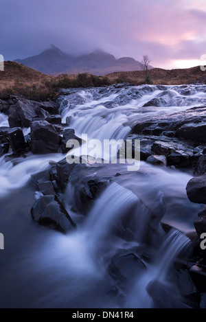 The river Allt Dearg Mor tumbling over a series of waterfalls in Glen Sligachan, Isle of Skye, Scotland. Winter (November) 2013. Stock Photo