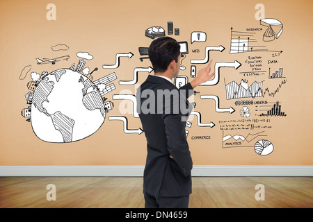 Composite image of asian businessman pointing Stock Photo