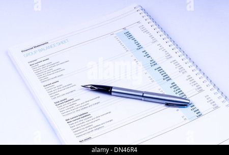 group balance sheet on white background Stock Photo