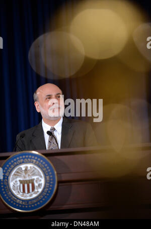 Washington DC, USA. 18th Dec, 2013. Outgoing U.S. Federal Reserve Board Chairman Ben Bernanke hosts a news conference after a Federal Open Market Committee (FOMC) meeting at the Federal Reserve building in Washington DC, capital of the United States, Dec. 18, 2013. The U.S. Federal Reserve announced on Wednesday that it will reduce its pace of bond purchases, the third round of quantitative easing program, by 10 billion U.S. dollars starting in January. Credit:  Zhang Jun/Xinhua/Alamy Live News Stock Photo