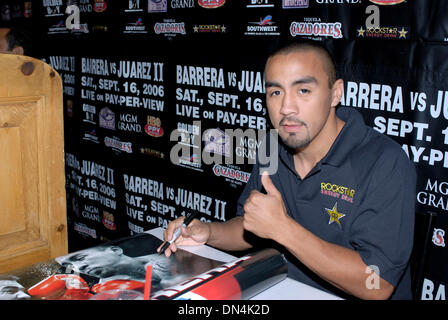 Sep 12, 2006; Los Angeles, CA, USA; Challenger ROCKY JUAREZ at the press conference for his upcoming September 17 rematch against WBC Super Featherweight Champion Marco Antonio Barerra . Barerra won the first match in hotly contested decision and hopes to eliminate any doubt on Saturday night. Mandatory Credit: Photo by Rob DeLorenzo/ZUMA Press. (©) Copyright 2006 by Rob DeLorenzo Stock Photo