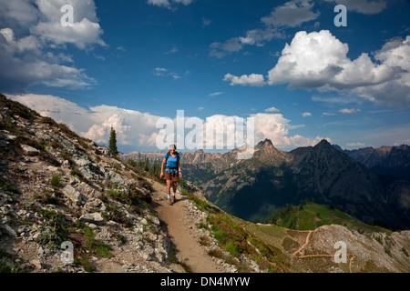 .WASHINGTON - Hiker on the Maple Pass trail in the Okanogan National Forest section of the North Cascades. Stock Photo