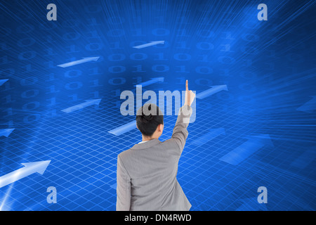 Composite image of asian businesswoman pointing Stock Photo
