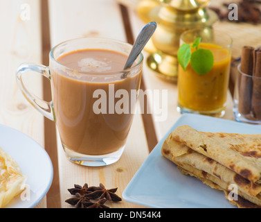 roti canai and teh tarik, very famous drink and food in malaysia Stock Photo