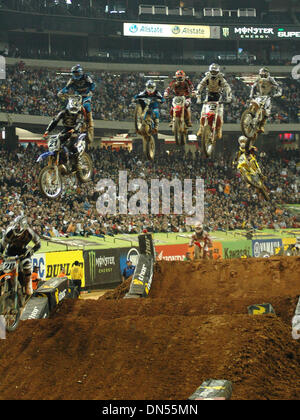 Feb 21, 2009 - Atlanta, Georgia, USA - Riders get some air on the triple jump at the Monster Energy Drink, AMA Supercross in the Georgia Dome. (Credit Image: © Timothy L. Hale/ZUMA Press) Stock Photo
