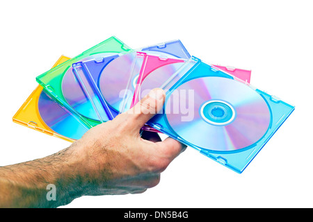 man's hand with the DVD isolated on white background Stock Photo
