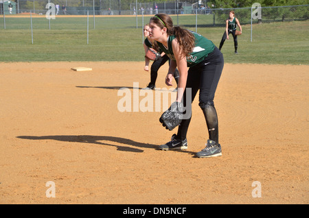 Player in High school softball game Stock Photo