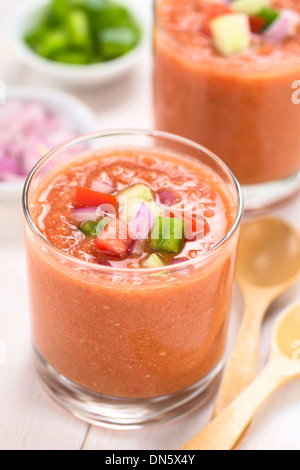 Traditional Spanish cold vegetable soup made of tomato, cucumber, bell pepper, onion, garlic and olive oil served in glasses Stock Photo
