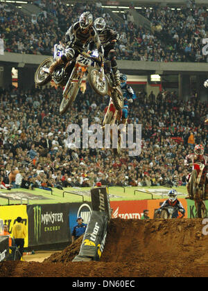 Feb 21, 2009 - Atlanta, Georgia, USA - Riders get some air on the triple jump at the Monster Energy Drink, AMA Supercross in the Georgia Dome. (Credit Image: © Timothy L. Hale/ZUMA Press) Stock Photo