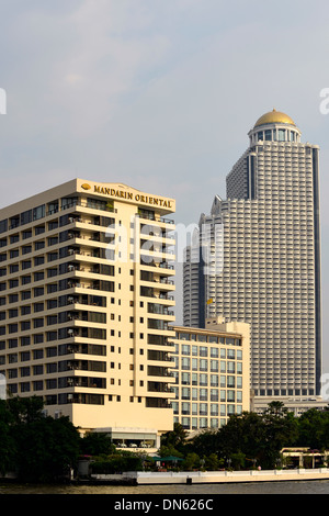 Mandarin Oriental Hotel and the State Tower at the Chao Phraya River, Bangkok, Thailand Stock Photo