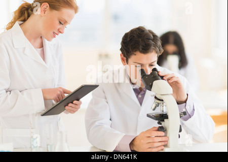 Scientists working in laboratory Stock Photo