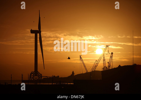 The worlds largest and most powerful offshore wind turbine looms large over the town of Methil, Fife. Stock Photo