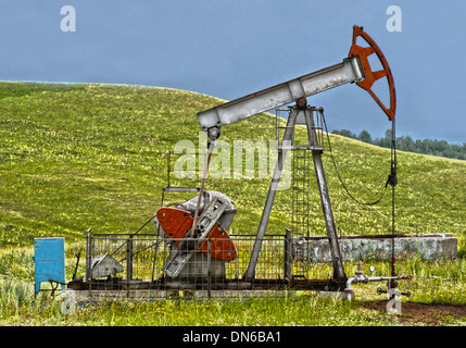 Old rusty oil pump in mountain, with hight detalisation Stock Photo