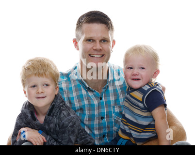 Father and two sons together as a happy family isolated Stock Photo