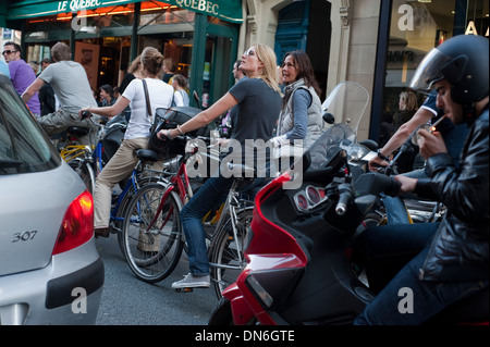 Paris, France, Group Tourists Cycling on Street on Bicycle Tour in Street, bicycling (Saint Germain des Pres District)