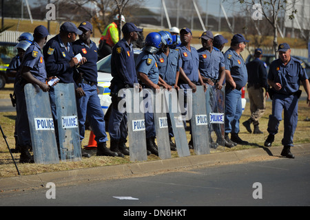 Armed South African police officers holding shotguns at a protest Stock ...