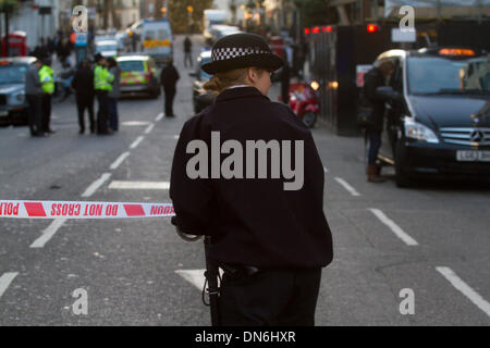 Bond Street London, UK. 19th December 2013. Several police officers were injured  in an incident involving stolen motorbike on a busy shopping day off Bond Street Credit:  amer ghazzal/Alamy Live News Stock Photo