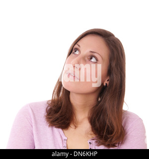 thoughtful young woman looking up Stock Photo