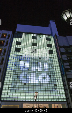 Uniqlo ginza store illuminated at night. Ginza. Tokyo. Stock Photo