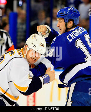 Tampa, Florida, USA. 19th Dec, 2013. DIRK SHADD | Times .Tampa Bay Lightning right wing B.J. Crombeen (19) drops the gloves and fights against Nashville Predators center Matt Hendricks (26) during first period action at the Times Forum in Tampa Thursday evening (12/19/13) Credit:  Dirk Shadd/Tampa Bay Times/ZUMAPRESS.com/Alamy Live News Stock Photo
